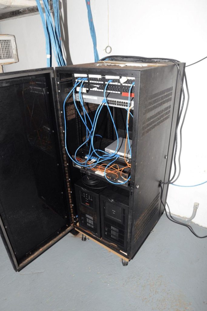 Tidy Server Cabling Helps Data Centres Stay Cooler Blue network cables run neatly between servers in a modern server room.